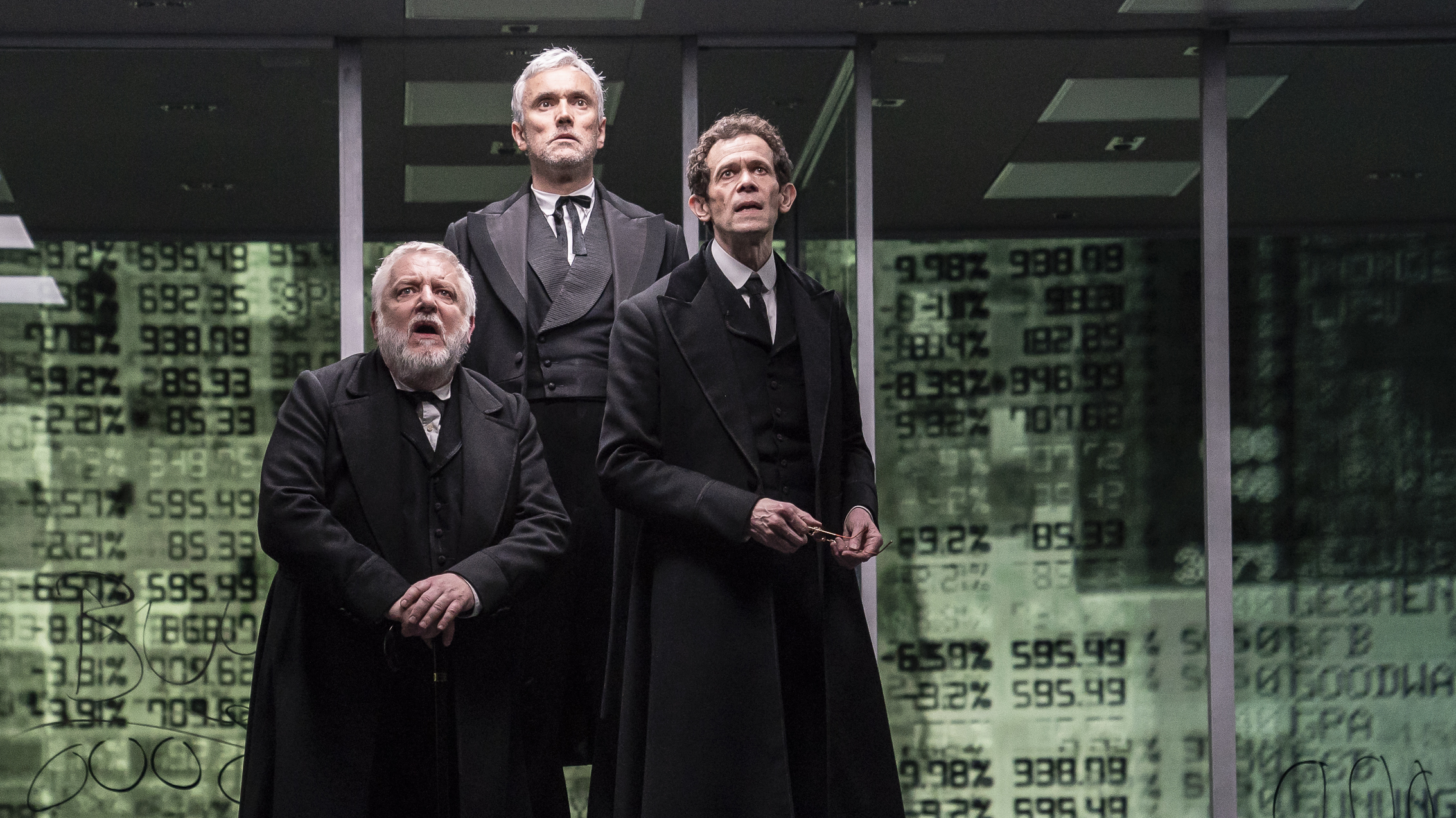Simon Russell Beale, Ben Miles and Adam Godley portray multiple characters in <em>The Lehman Trilogy</em>, about the rise and fall of Lehman Brothers. (Stephanie Berger)