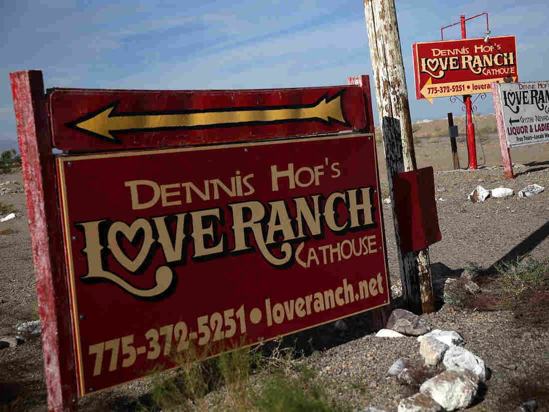 CRYSTAL, NV - OCTOBER 14: Signs for Dennis Hof's Love Ranch Las Vegas brothel are shown on October 14, 2015 in Crystal, Nevada.