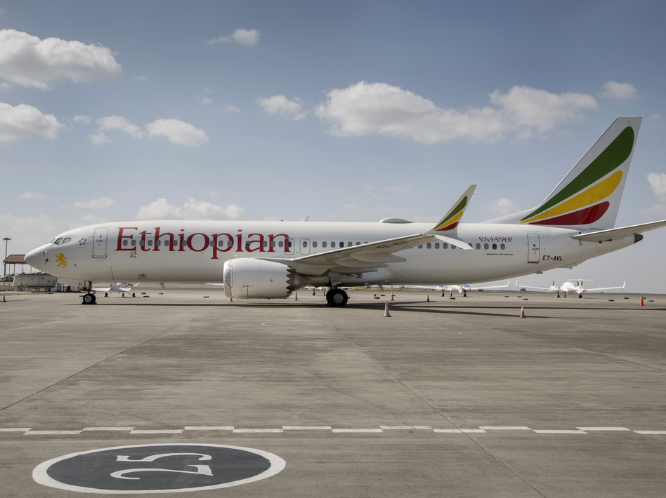 An Ethiopian Airlines Boeing 737 Max 8 sits grounded in Addis Ababa, Ethiopia, in March. Ethiopian officials on Thursday released the initial report into last month's crash of a Max 8. (Mulugeta Ayene/AP)