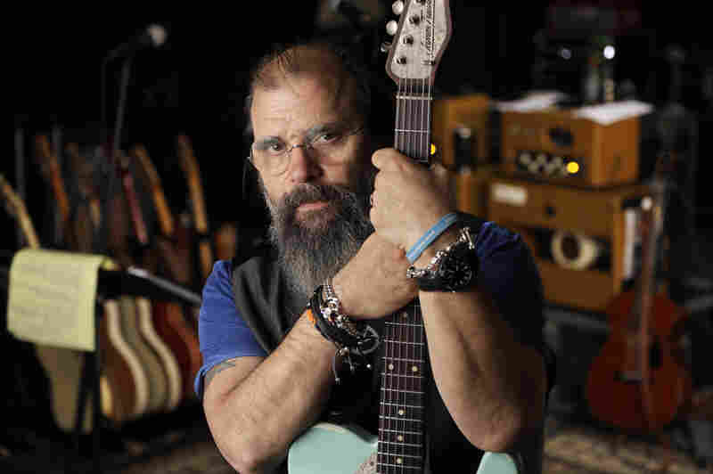 Steve Earle poses in a rehearsal studio in Nashville, Tenn., on June 8, 2017.