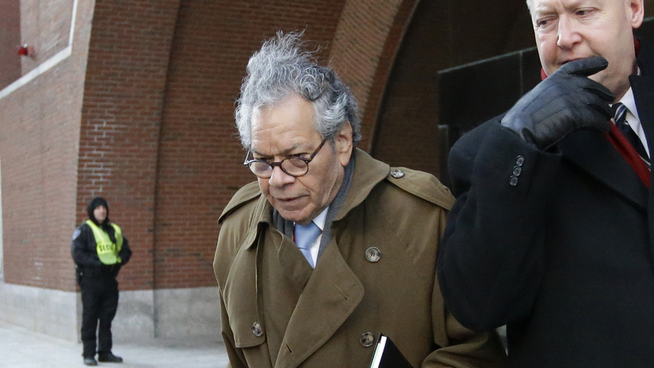 Insys Therapeutics founder John Kapoor (center) departs federal court in Boston in January. The criminal trial of Kapoor and four other executives from the company wrapped up on Friday. (Steven Senne/AP)