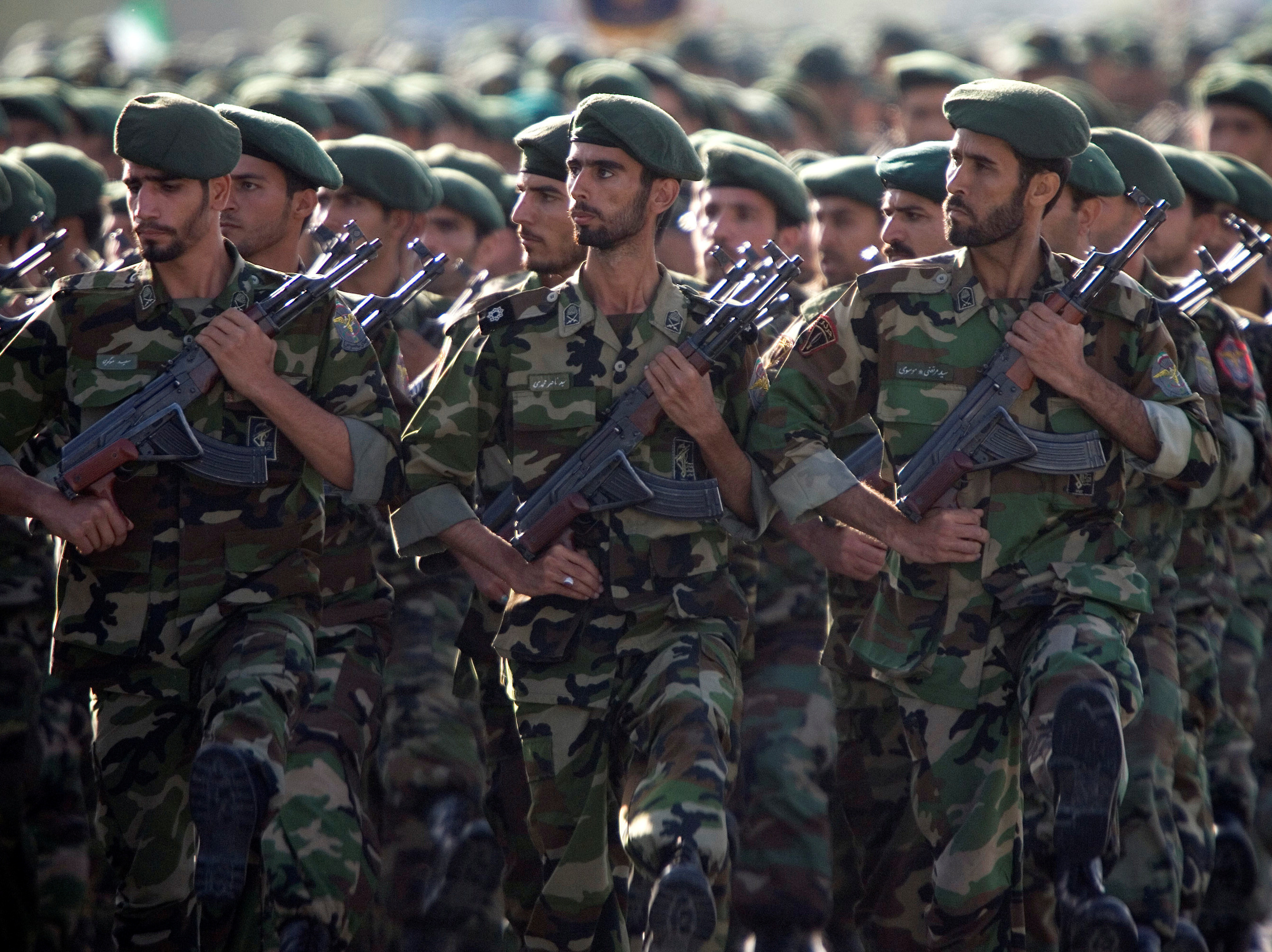 The U.S. has designated Iran's Revolutionary Guard Corps as a terrorist group. Here, members of the force march during a 2007 military parade in Tehran. (Reuters)
