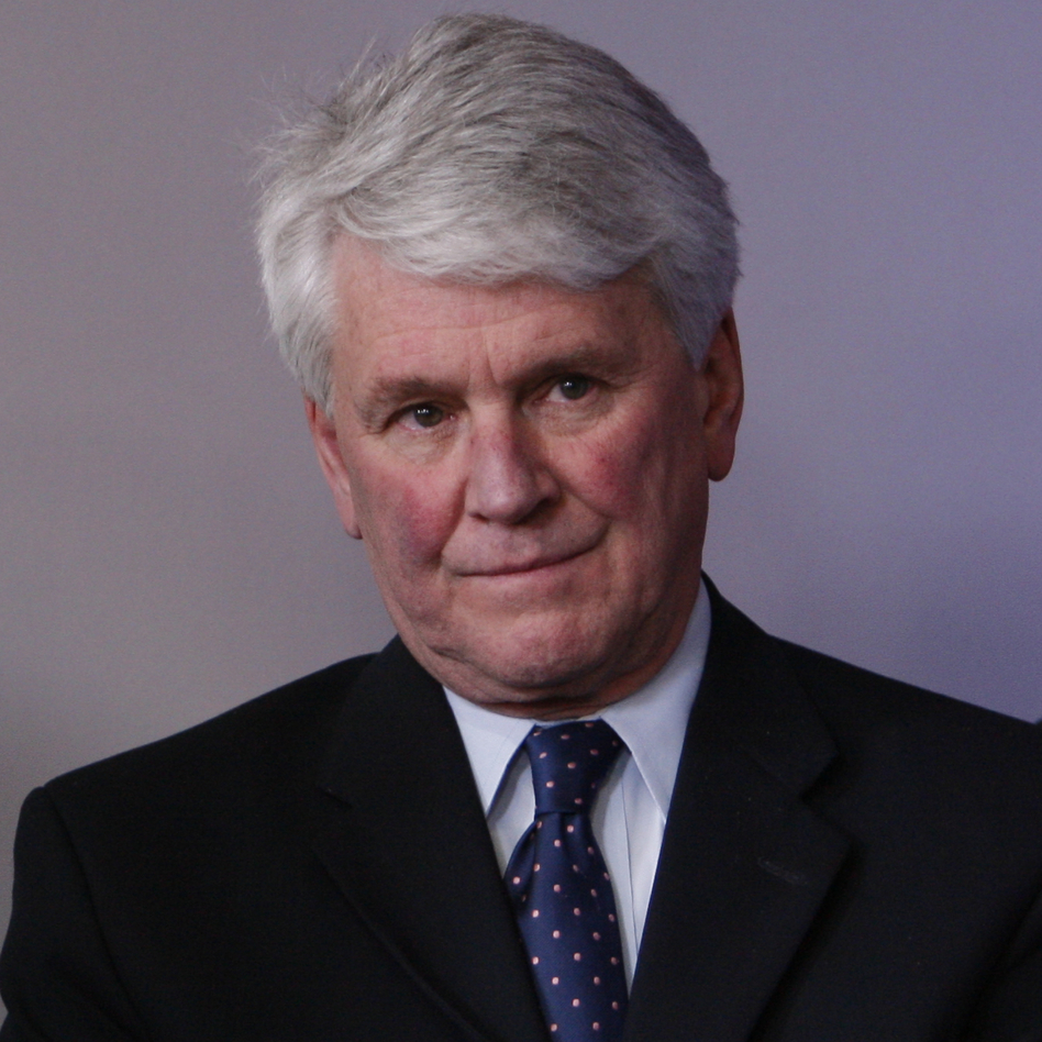 Then-White House counsel Greg Craig listens as President Barack Obama makes a surprise appearance during the daily press briefing at the White House on May 1, 2009. (Charles Dharapak/AP)