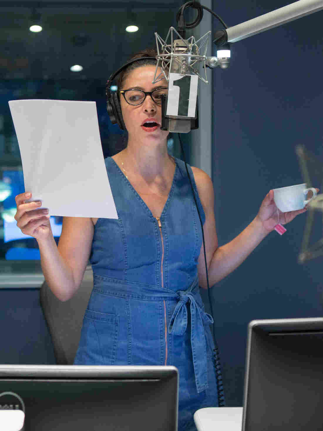 Code Switch reporter Shereen Marisol Meraji records a segment at NPR West in Culver City, CA, on September 24, 2018. (photo by Allison Shelley for NPR)