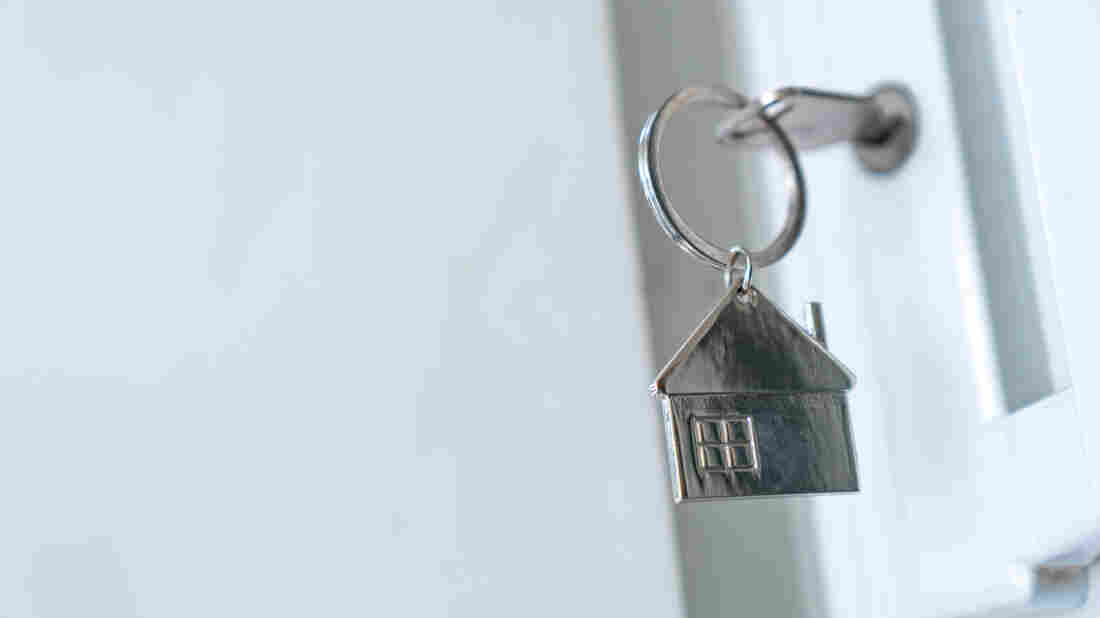 House key in door.
