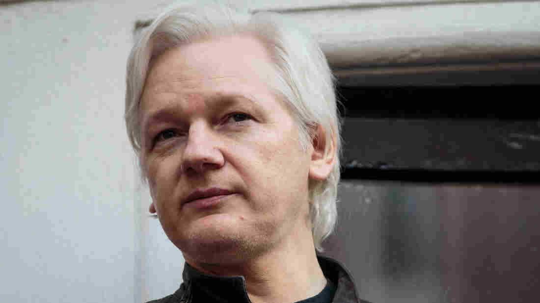 Hillary Clinton says Assange 'has to answer for what he has done'
