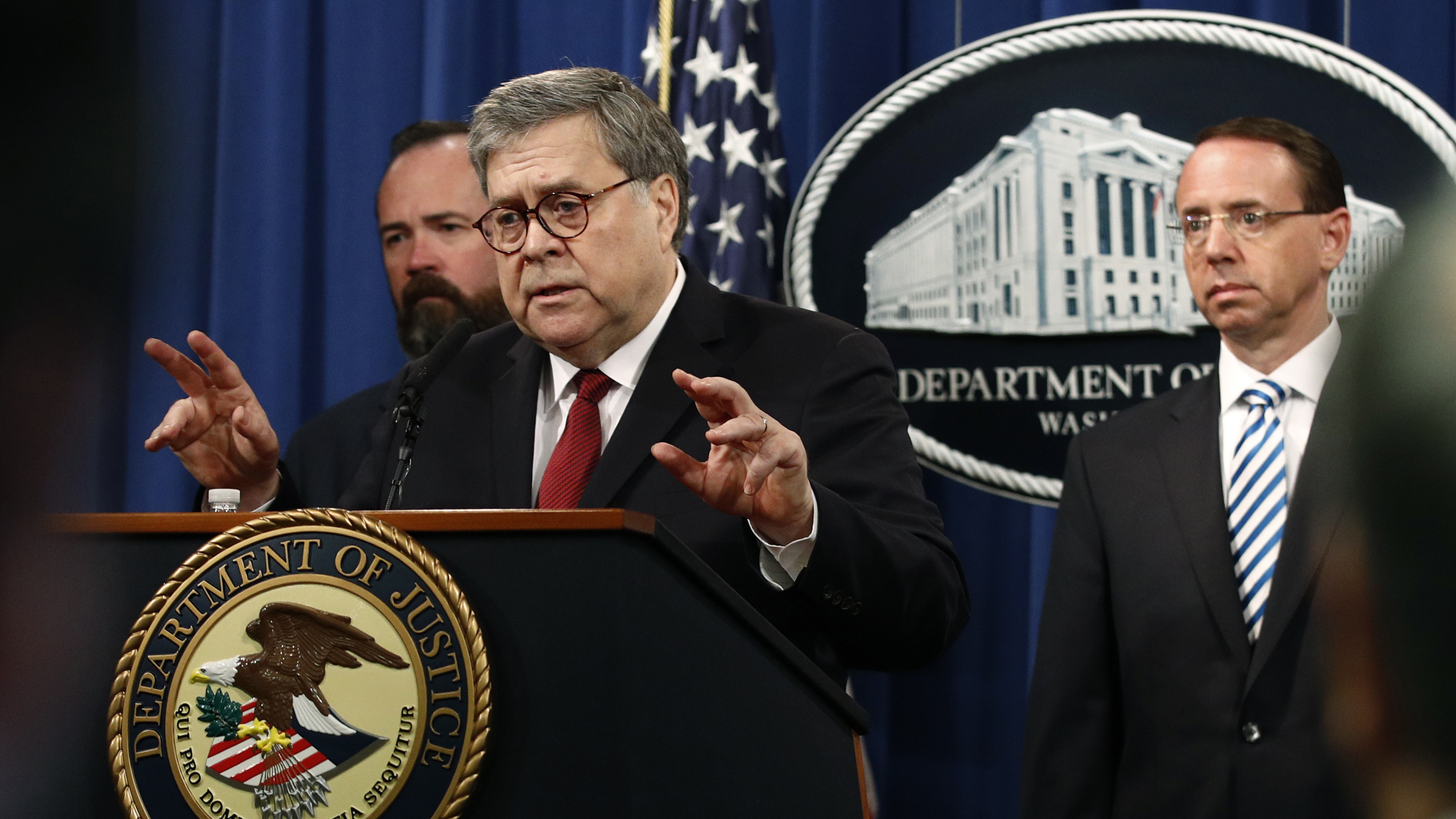 Attorney General William Barr, center, holds a press conference Thursday before the redacted Mueller report's release.