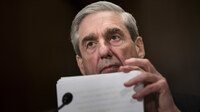 Robert Mueller testifies before Congress in 2013. A redacted version of Mueller's report as special counsel was released on Thursday.