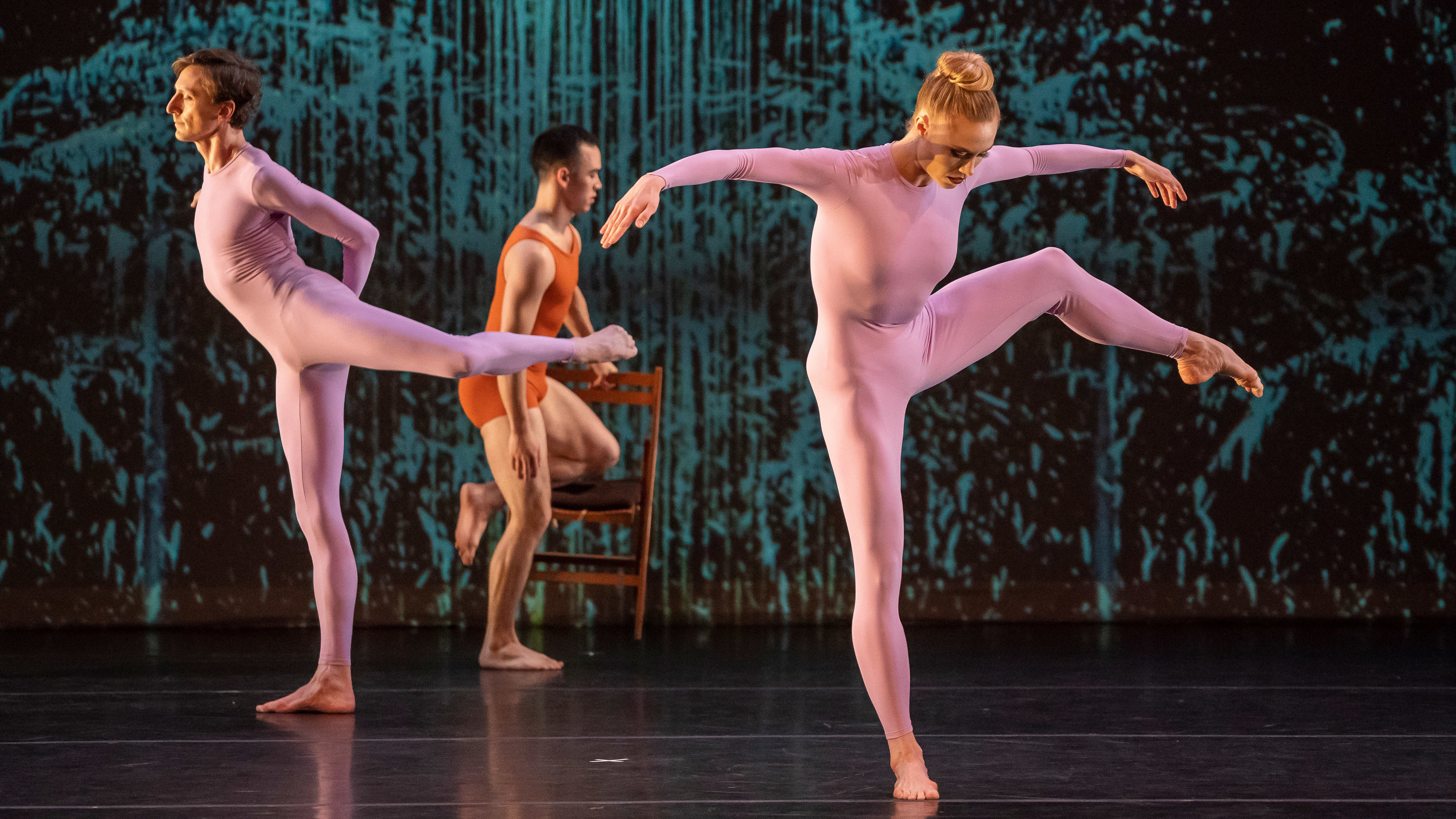 L-R: Dancers Reid Bartelme, David Norsworthy and Sara Mearns perform in the Merce Cunningham centennial tribute Night of 100 Solos at Brooklyn Academy of Music in New York. The staging of the event often saw multiple dancers performing independent solo routines simultaneously.