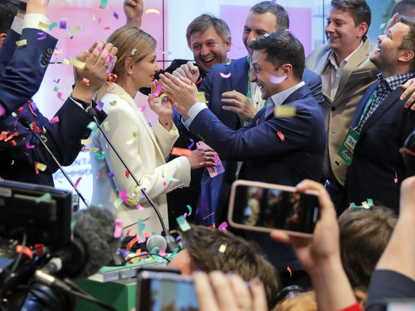 Ukrainian comedian Volodymyr Zelenskiy (center right) defeated incumbent Petro Poroshenko in a landslide.