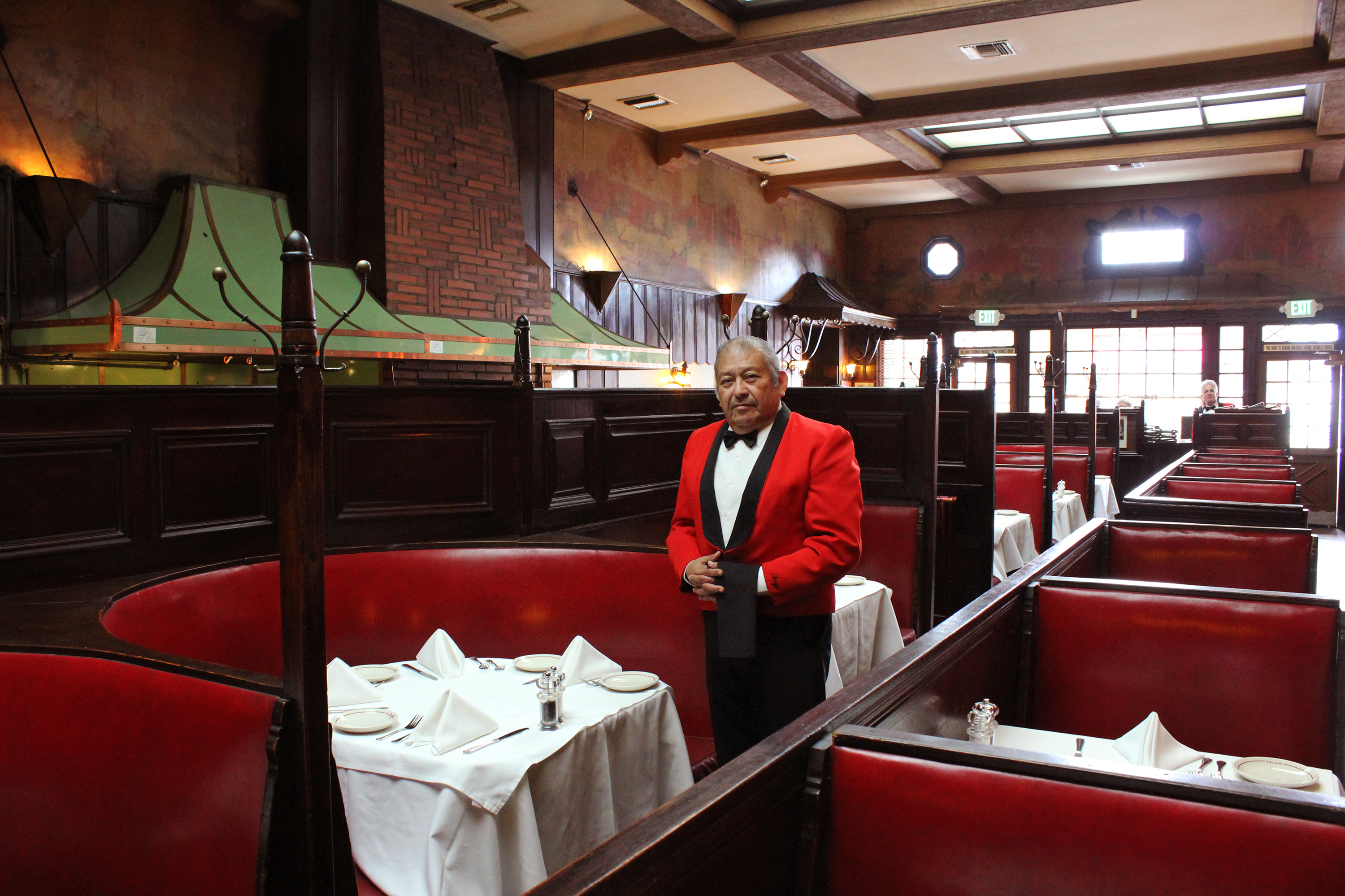 Waiter Sergio Gonzalez, 66, has been working at Musso & Frank Grill on Hollywood Boulevard since he was 19 years old. (NPR)