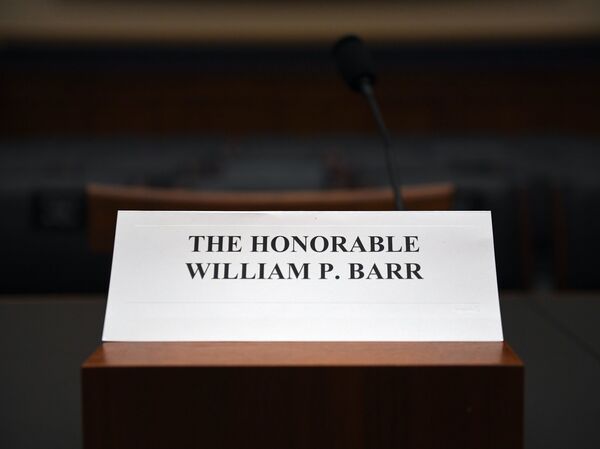 Attorney General William Barr's place sits empty at the House Judiciary Committee room on Capitol Hill in Washington, D.C., on Thursday. Barr has refused to testify before the committee hearing on his handling of the report from special counsel Robert Mueller on Russian interference in the 2016 U.S. presidential election.