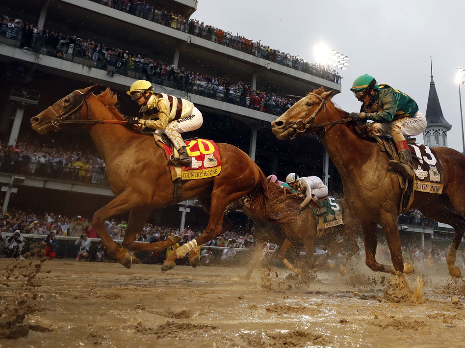 Flavien Prat rides Country House to victory during the 145th running of the Kentucky Derby. (Matt Slocum/AP)