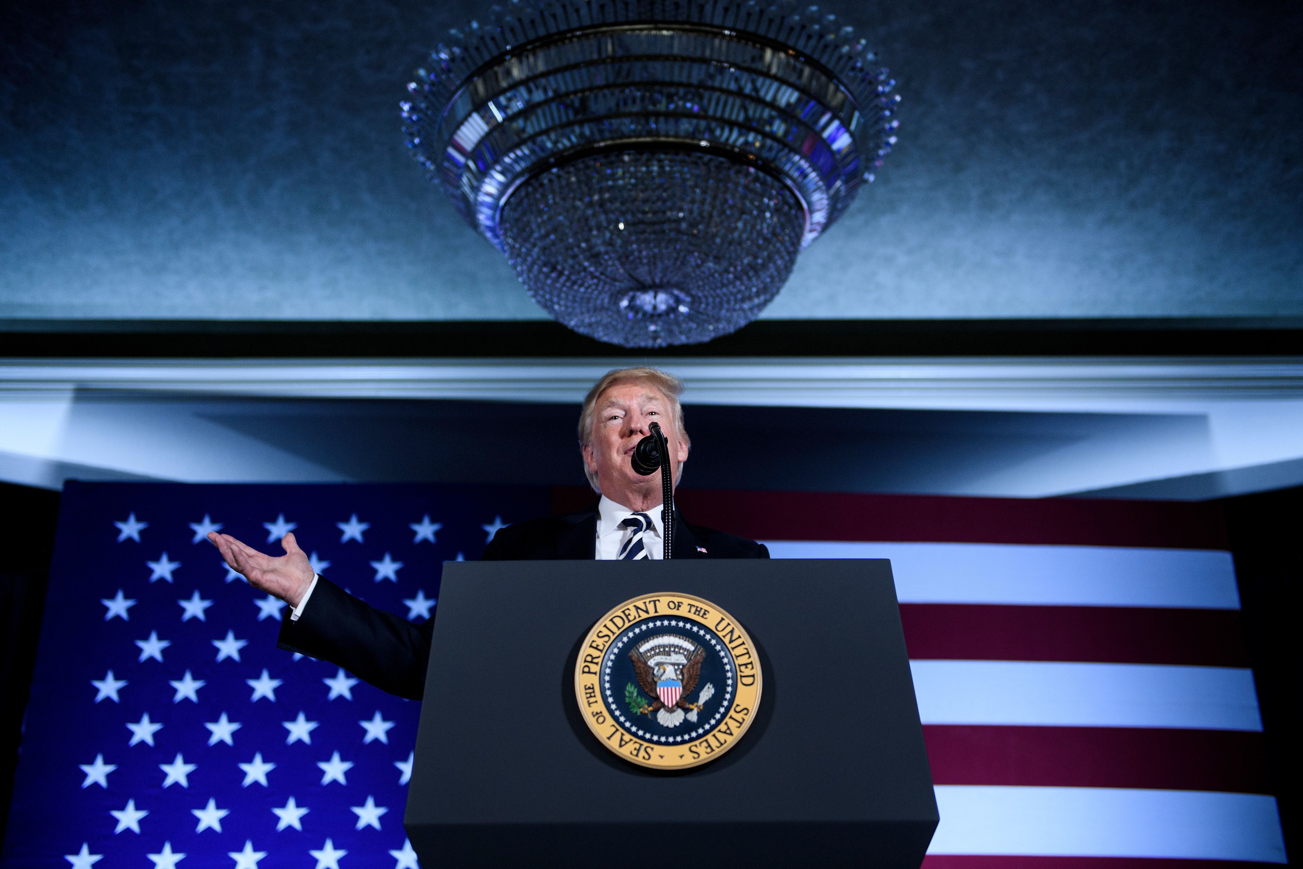 President Donald Trump speaks during an August 2018 fundraiser in Charlotte, N.C. As president, Trump has embraced high dollar fundraising events that he criticized while running for office. (AFP/Getty Images)