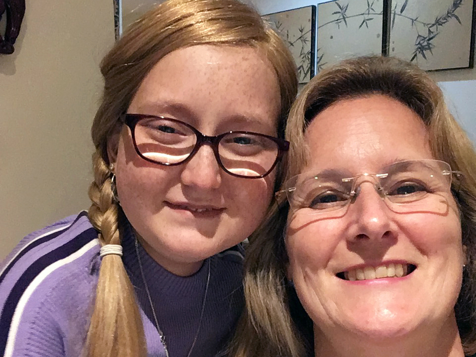 Isabelle Carnell-Holdaway (left), now 17, with her mother Joanne Carnell-Holdaway. Isabelle has a dangerous infection that is being treated with a cocktail of genetically modified viruses. (Courtesy of Jo Holdaway)