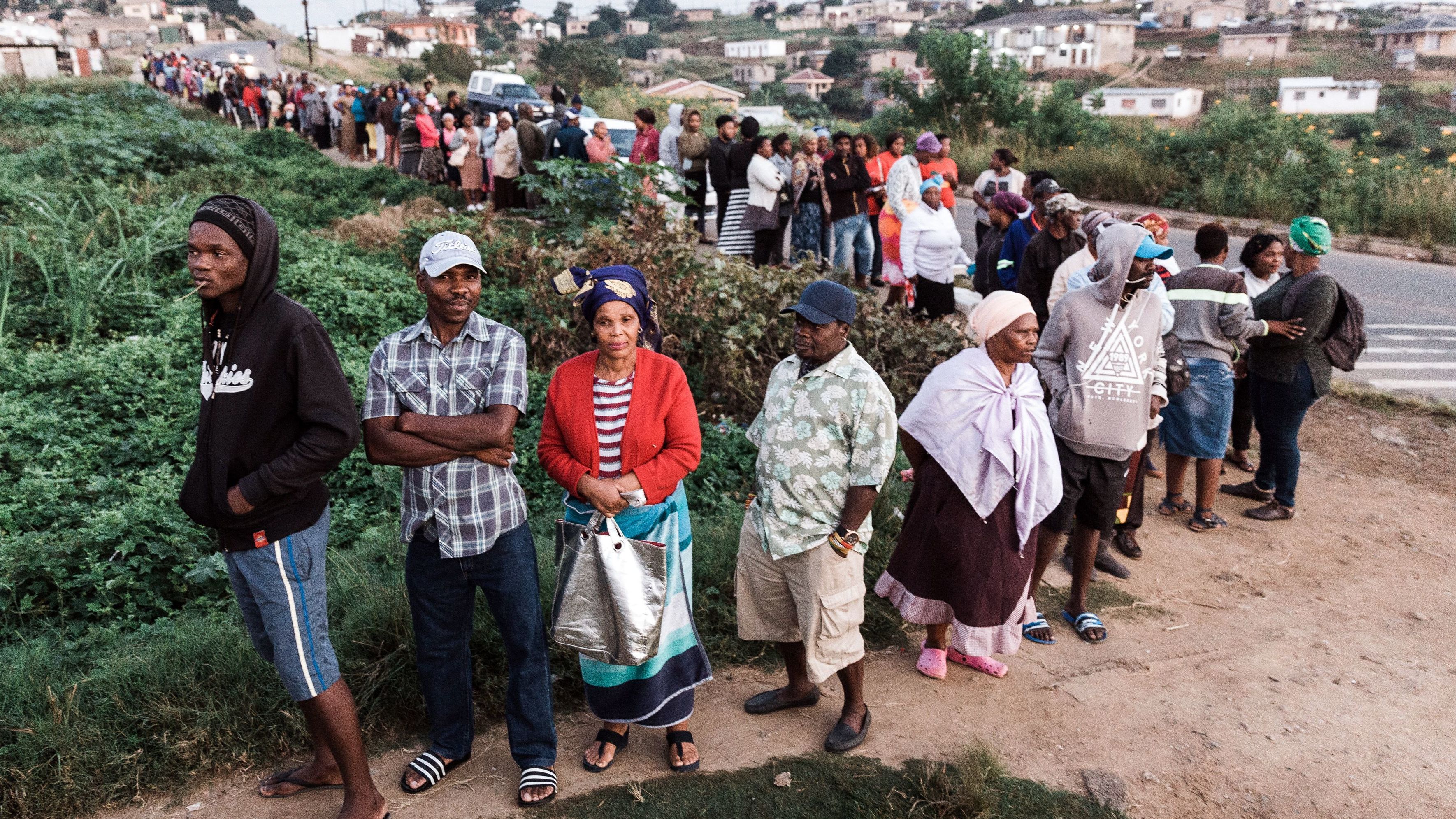 Hundreds of South African voters wait in long lines outside of a Durban polling station on Wednesday.