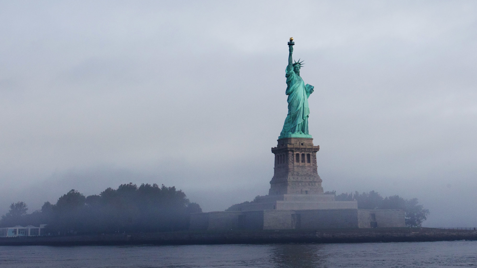 The Statue of Liberty, which stands on Ellis Island in New York Harbor, was the America's busiest immigrant inspection station from 1892 until 1954. (Getty Images)