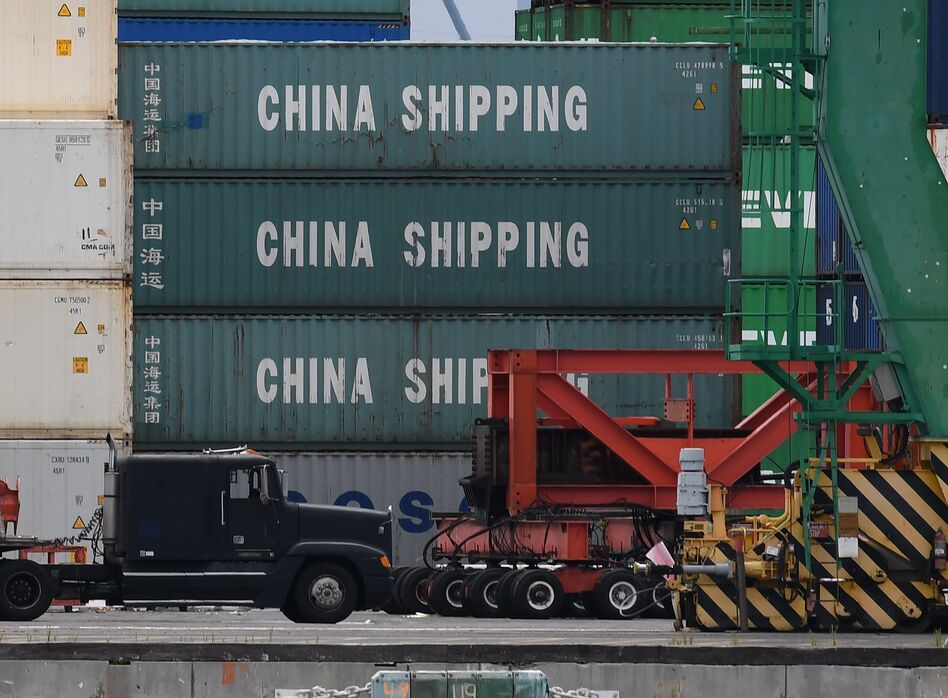 Cargo is unloaded from a container ship at the main port terminal in Long Beach, Calif., on Friday. Two days of trade talks between the U.S. and China ended without a deal to avert more tariffs. (Mark Ralston/AFP/Getty Images)