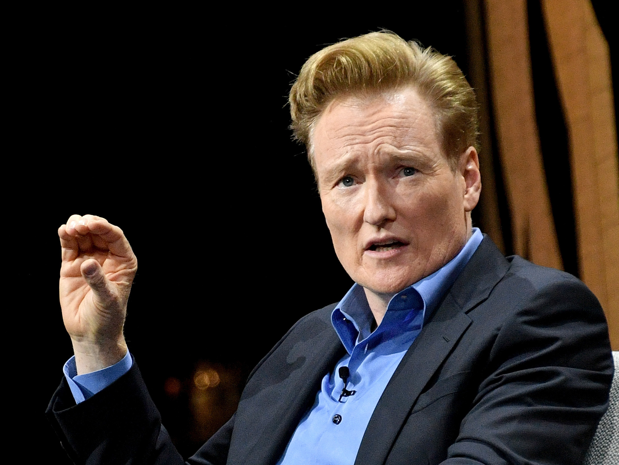 Late night TV host Conan O'Brien, pictured in 2016, has settled a lawsuit with a man who accused O'Brien and his writing staff of stealing his jokes. (Getty Images for Vanity Fair)