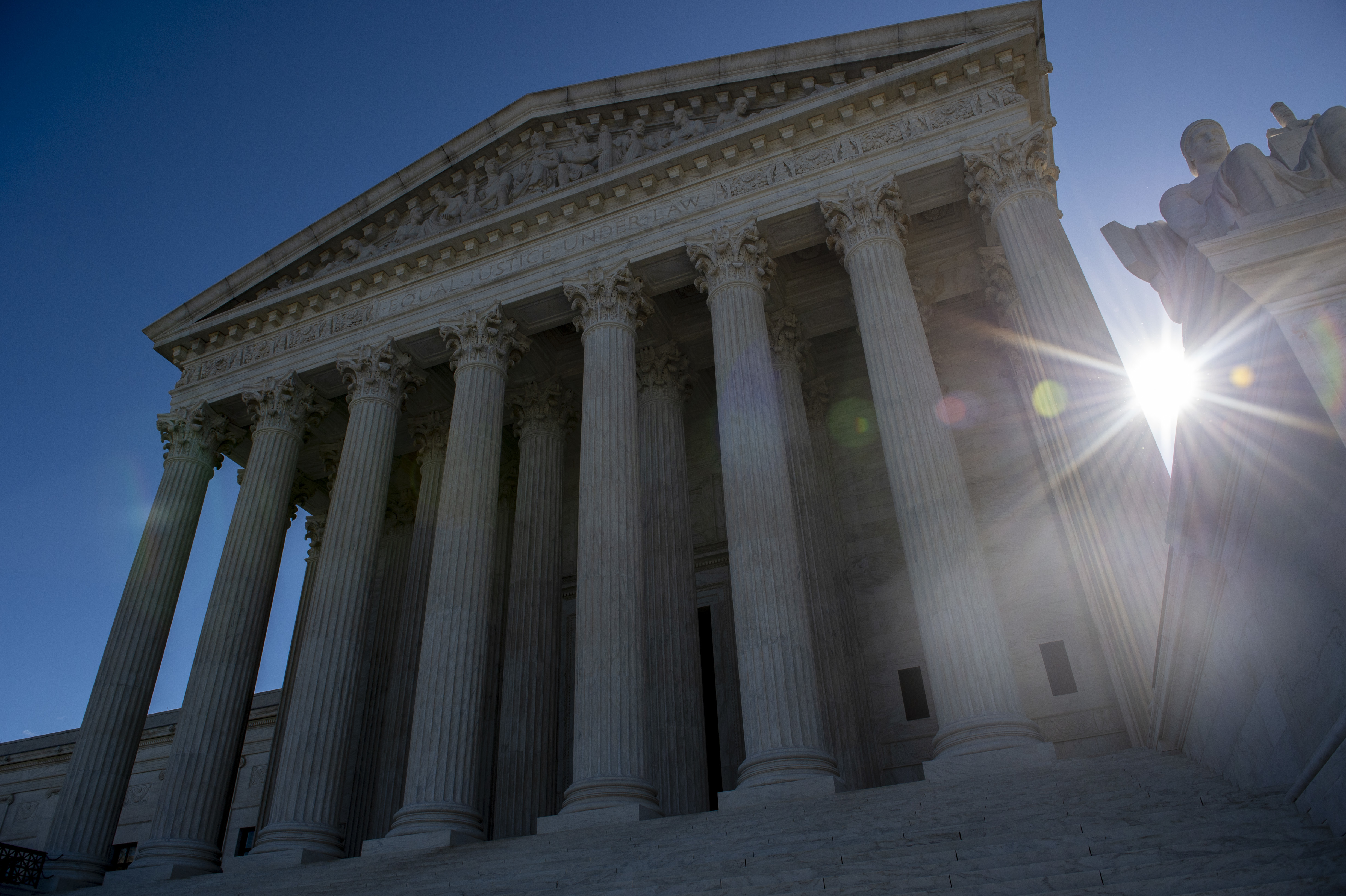 Amid controversy and criticism from religious groups on the right and left about their decisions in recent death penalty cases, the U.S. Supreme Court's five-man majority is striking back. (AFP/Getty Images)