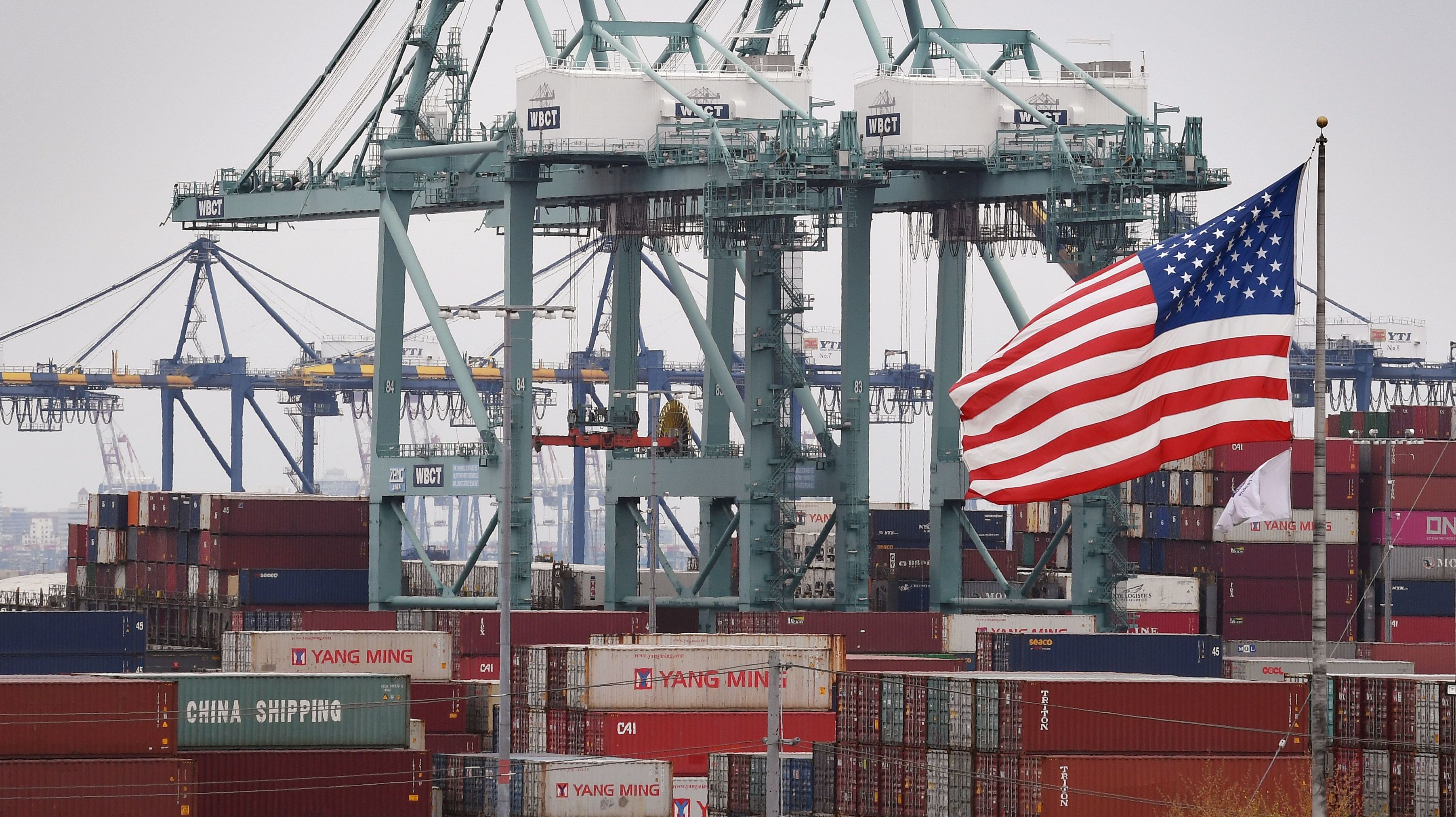 Chinese shipping containers are stored at the Port of Los Angeles in Long Beach, Calif. Americans like trade, in bigger numbers than ever. But they also believe China doesn