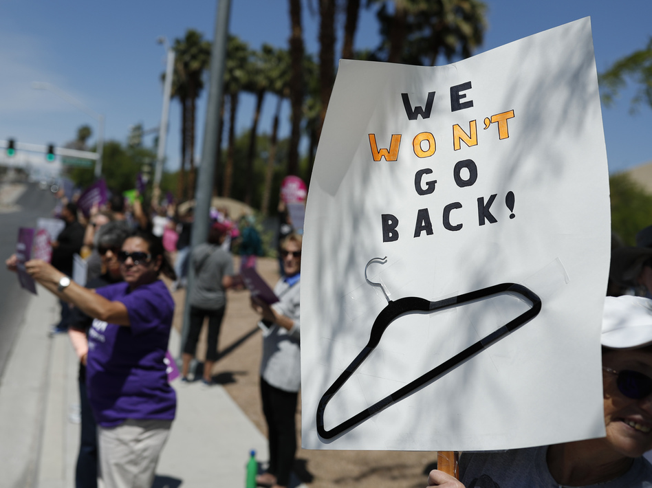 People rally in support of abortion rights on Tuesday in Las Vegas.