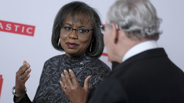 Anita Hill speaks with journalist Bob Woodward before the 2019 PEN America Literary Gala in New York City, where they were both recognized with awards Tuesday.