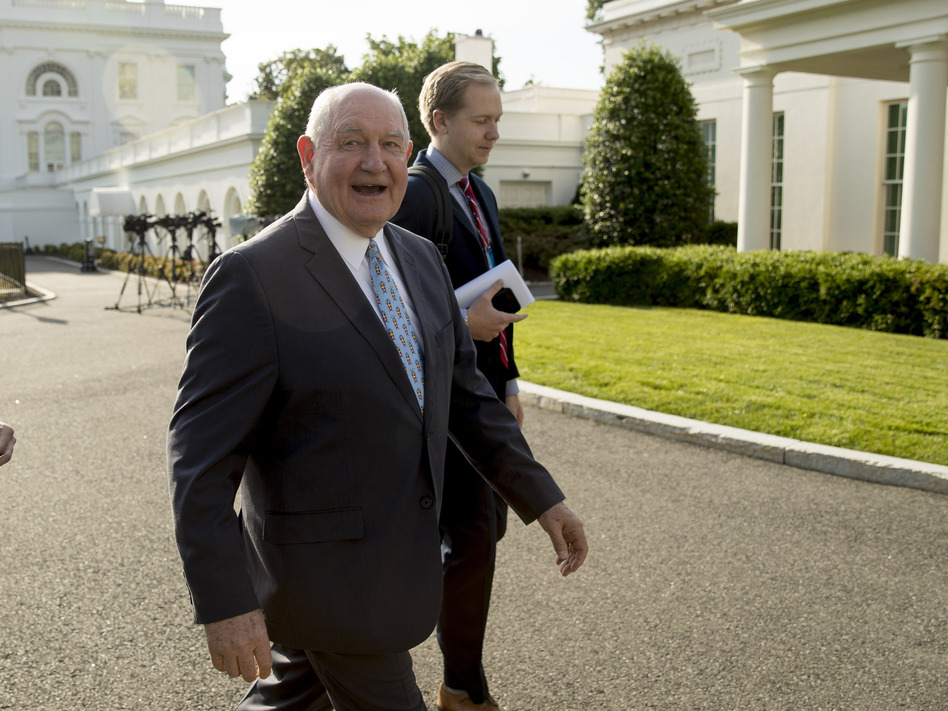 Agriculture Secretary Sonny Perdue announced on Thursday $16 billion in aid to help farmers hurt by the ongoing U.S.-China trade dispute. (Andrew Harnik/AP)