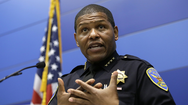 San Francisco Police Chief William Scott answers questions during a May 21 news conference. Scott has apologized for a raid on a freelance journalist