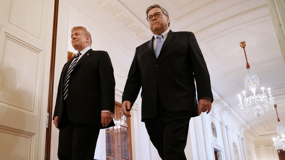 President Trump and Attorney General William Barr attend an event at White House on Wednesday. Trump has empowered Barr to investigate the origins of the special counsel probe and reveal his findings. (Chip Somodevilla/Getty Images)
