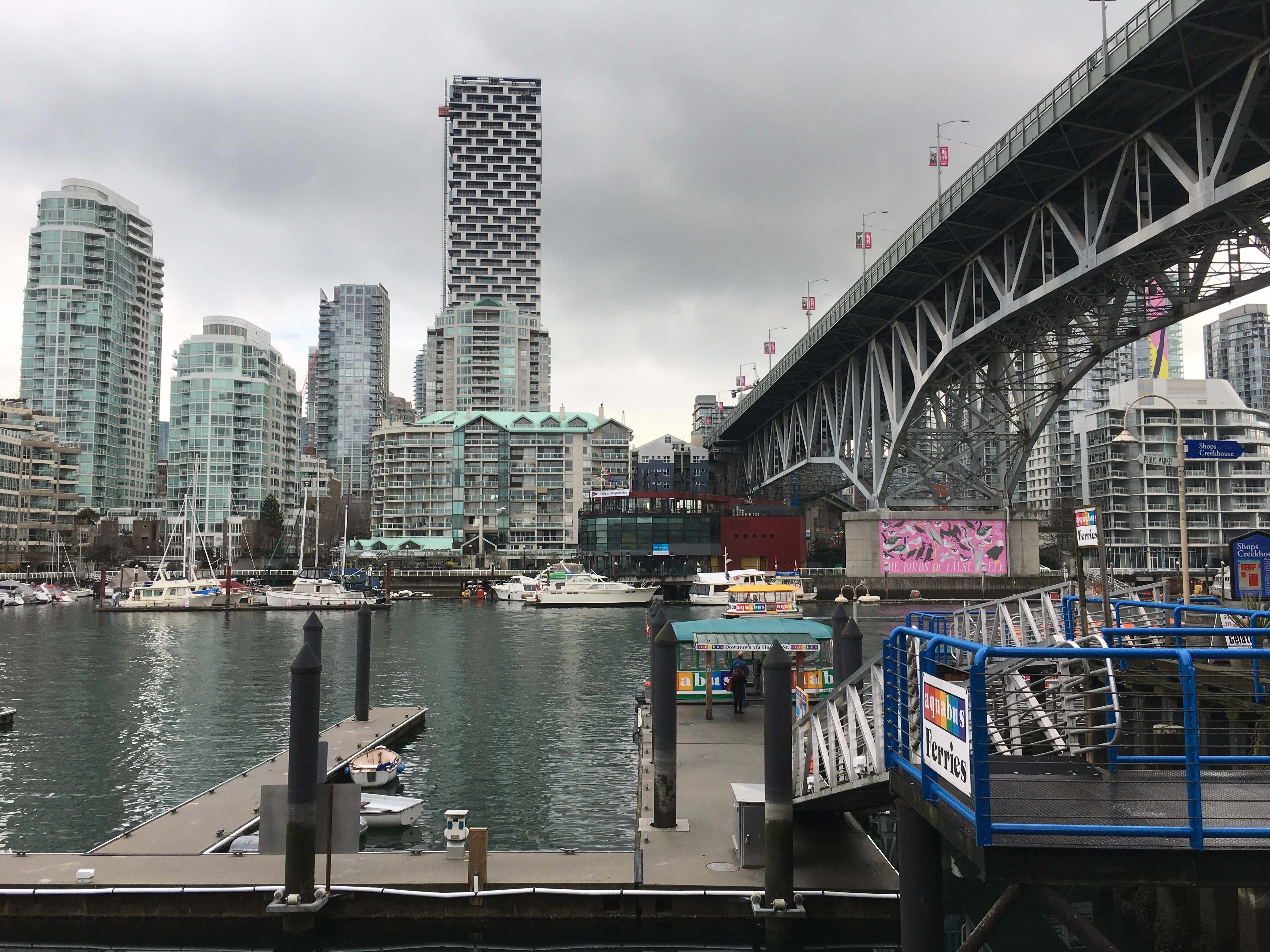 The Granville Street Bridge leads to downtown Vancouver, whose skyline of gleaming apartment towers hugging the waterfront is reminiscent of Hong Kong. (Jackie Northam/NPR)