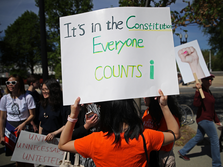 Protesters gather outside the U.S. Supreme Court in April as the justices hear oral arguments over the citizenship question the Trump administration wants to add to the 2020 census.