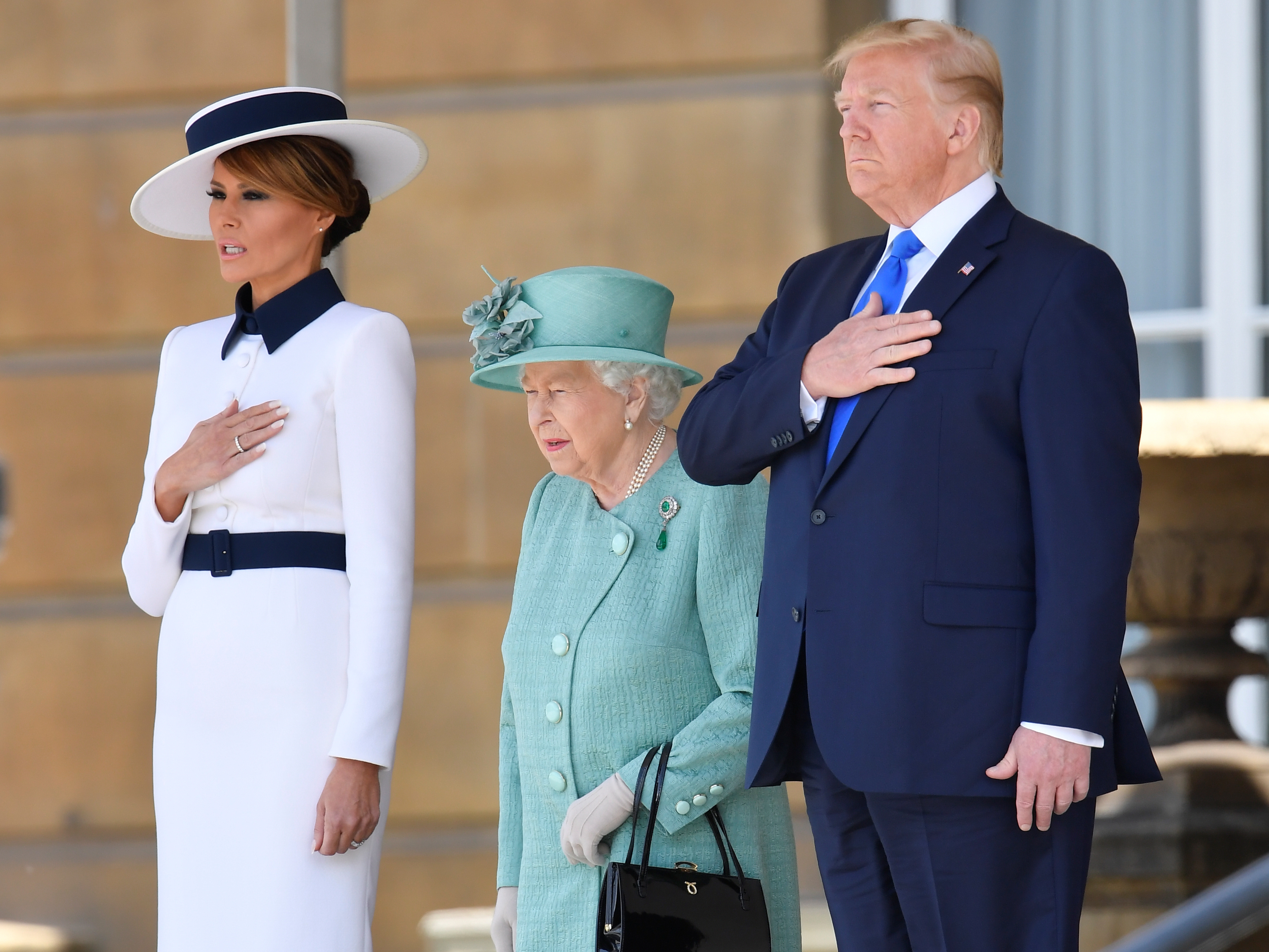 President Trump and first lady Melania Trump were welcomed to the U.K. by Queen Elizabeth II in a ceremony Monday at Buckingham Palace. (Reuters)