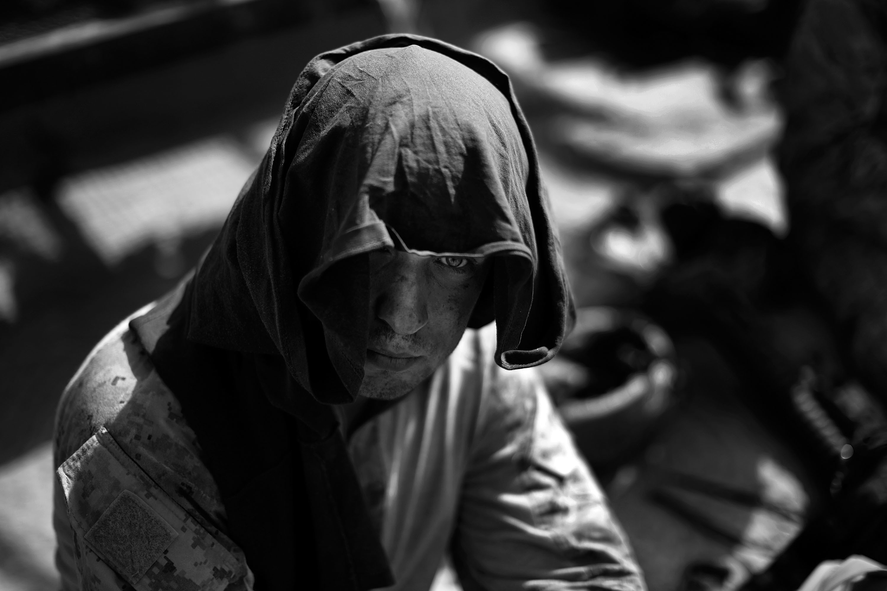 An Artist And A Warrior: Colleague Remembers Fallen NPR Photographer David Gilkey 14 A soldier tries to cool off in the intense Afghan heat.