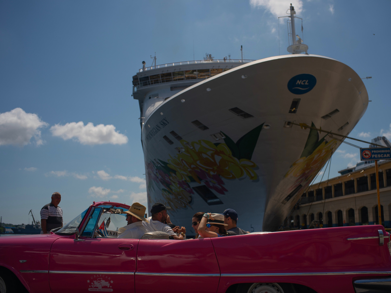 Tourists who have just disembarked from a cruise liner tour Havana on Tuesday. The Trump administration has imposed major new travel restrictions on visits to Cuba by U.S. citizens. (Ramon Espinosa/AP)