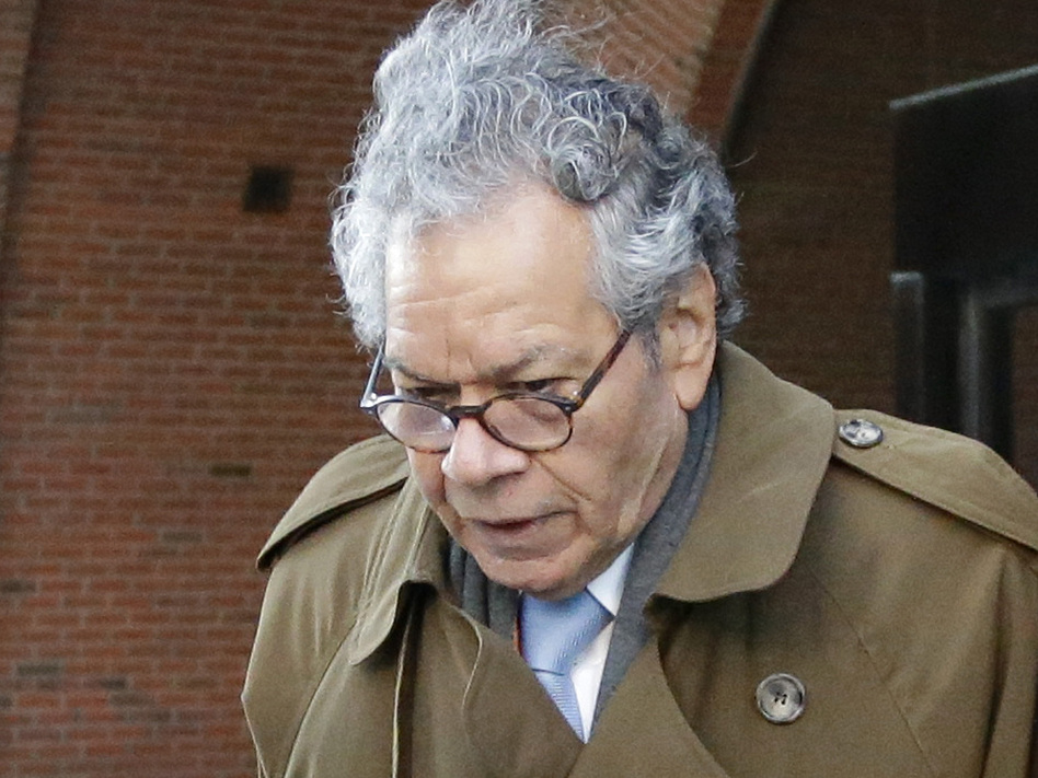 Insys Therapeutics founder John Kapoor departs federal court in Boston, Jan. 30. On Monday the company filed for Chapter 11 bankruptcy, saying it needs to sell its assets to pay back creditors. Kapoor, who was convicted last month of racketeering, owns more than 63% of the company. (Steven Senne/AP)