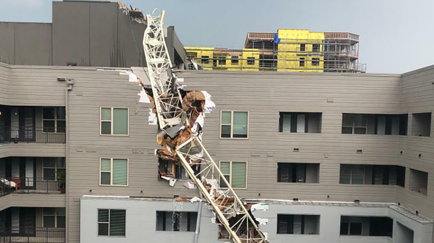 Crane Collapse In Dallas High Winds Topple Crane Onto Apartment