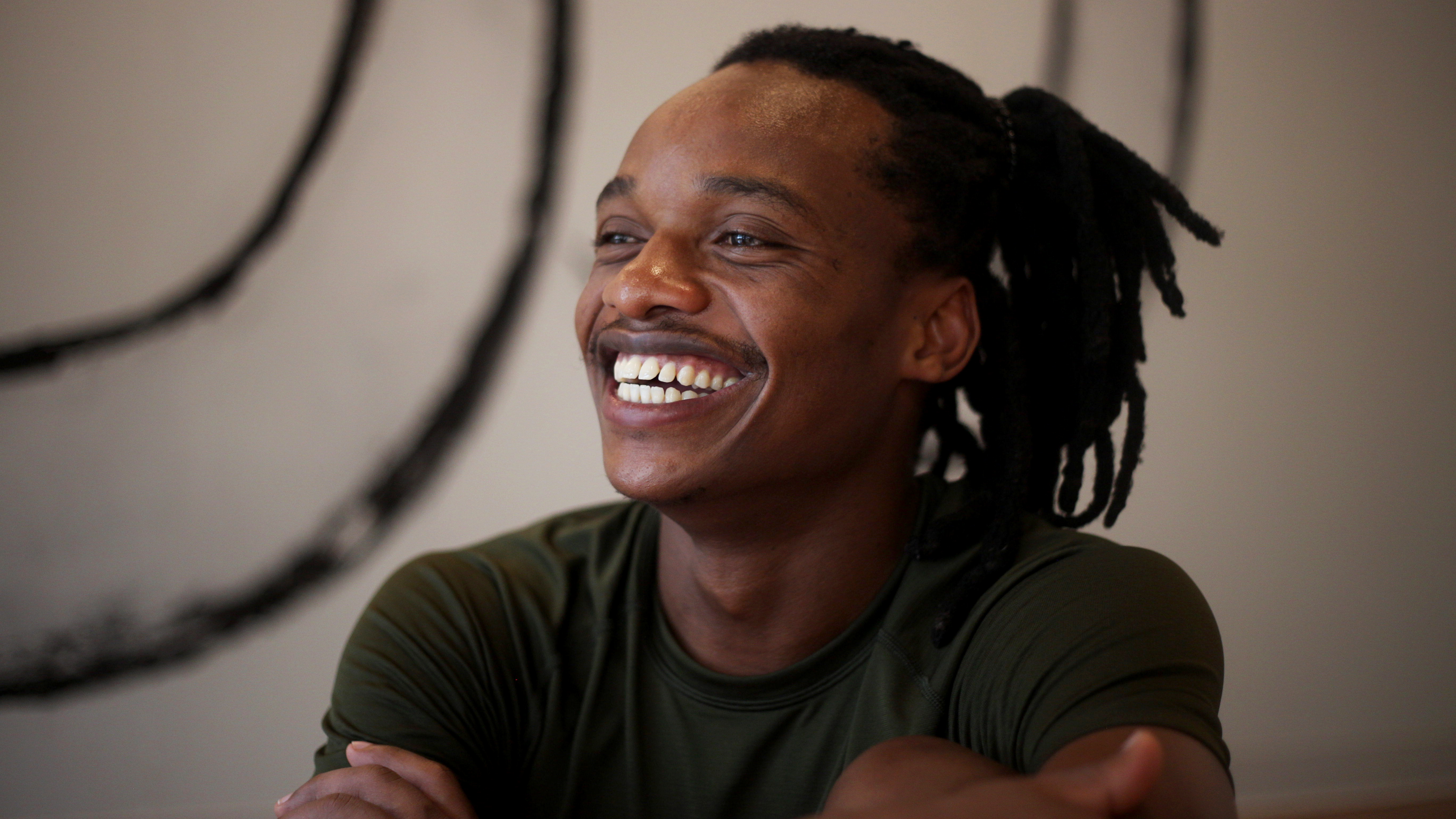 Walter Mugwe in Washington, D.C., this summer, where he brought his love for yoga to the students at the Down Dog Yoga studio.