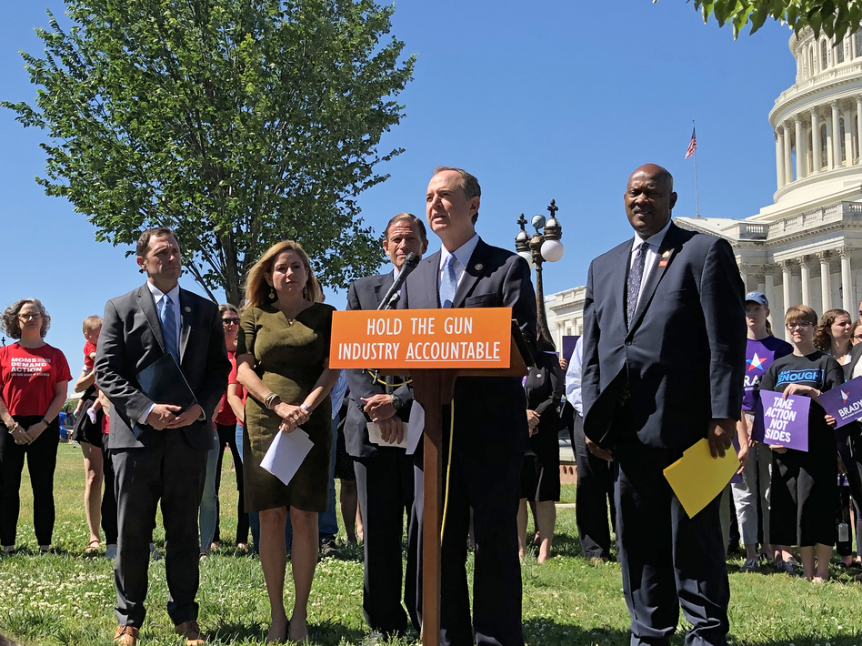 California Rep. Adam Schiff speaks at a news conference as Rep. Jason Crow of Colorado (from left), Rept. Debbie Mucarsel-Powell of Florida, Sen. Richard Blumenthal of Connecticut and Rep. Dwight Evans of Pennsylvania look on. The Democratic leaders introduced the Equal Access to Justice for Victims of Gun Violence Act on Tuesday. (Brakkton Booker/NPR)
