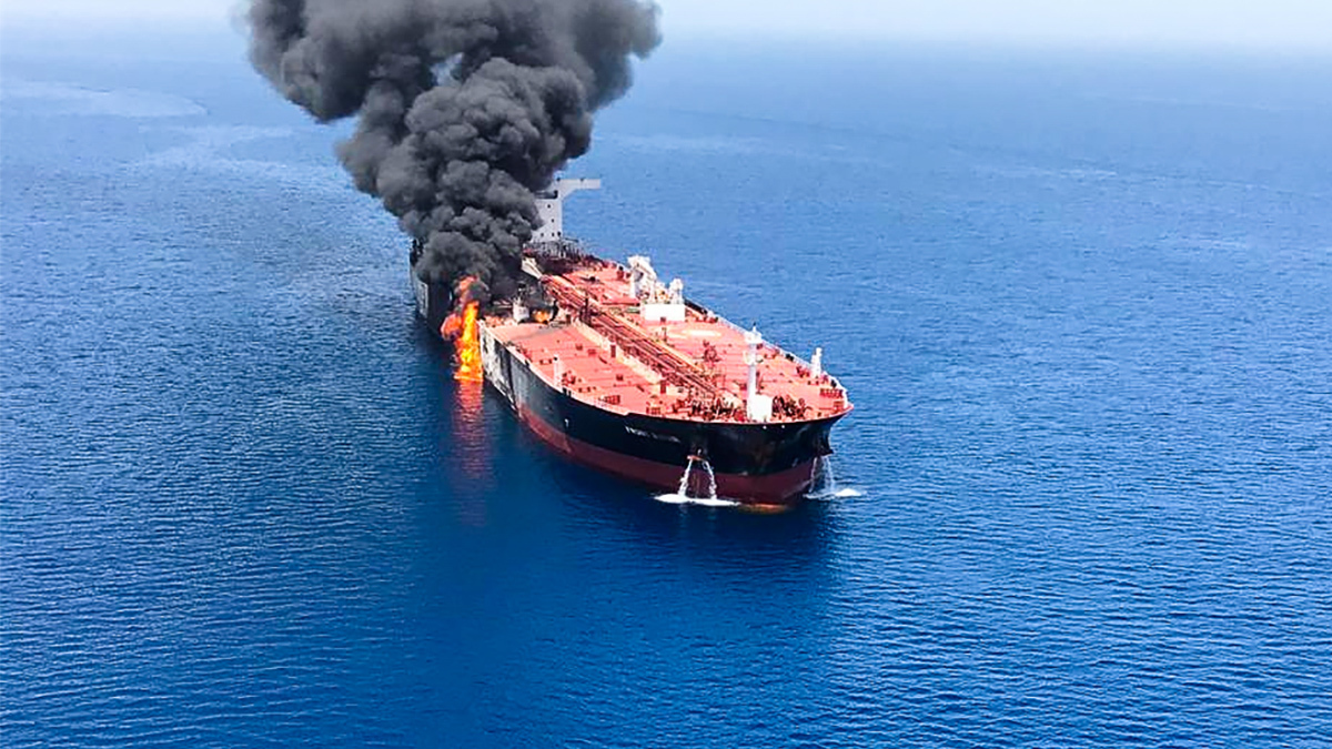 A picture obtained from  Iranian News Agency ISNA on Thursday shows fire and smoke billowing from Norwegian-owned Front Altair tanker said to have been attacked in the waters of the Gulf of Oman. (AFP/Getty Images)