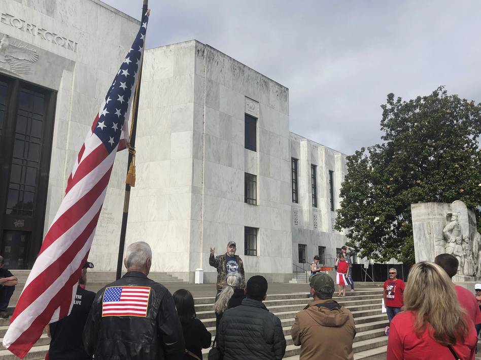 On Sunday, a small crowd showed its support of a Republican walkout outside the Oregon state Capitol in Salem. (Sarah Zimmerman/AP)