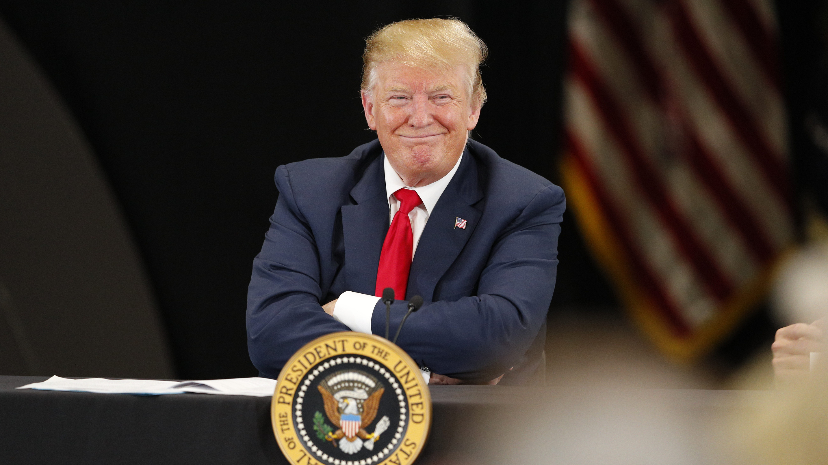 President Trump speaks at a roundtable on the economy and tax reform in April. Heading into the 2020 campaign, Democratic candidates are trying to find arguments against him on the economy, which is doing well according to top-line indicators. (Getty Images)