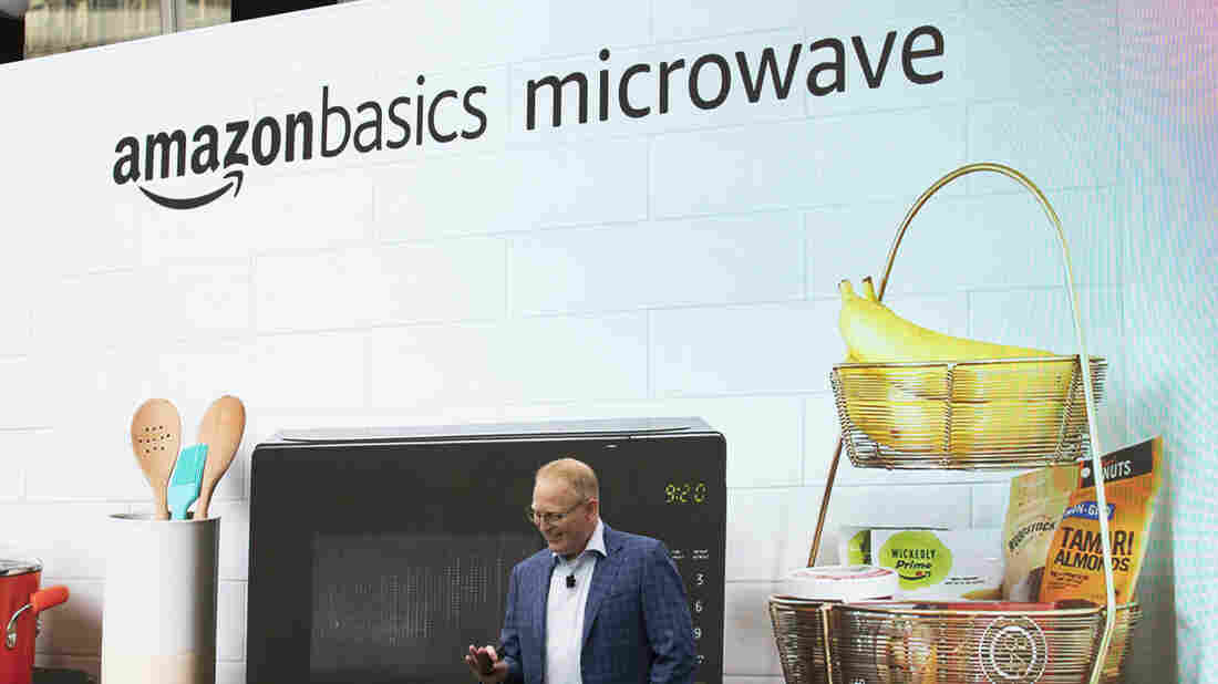 Dave Limp, Senior Vice President of Amazon Devices, intoduces the "amazonbasics microwave," which can be controlled by an Alexa, at the Amazon Spheres.(Photo by Stephen Brashear/Getty Images)