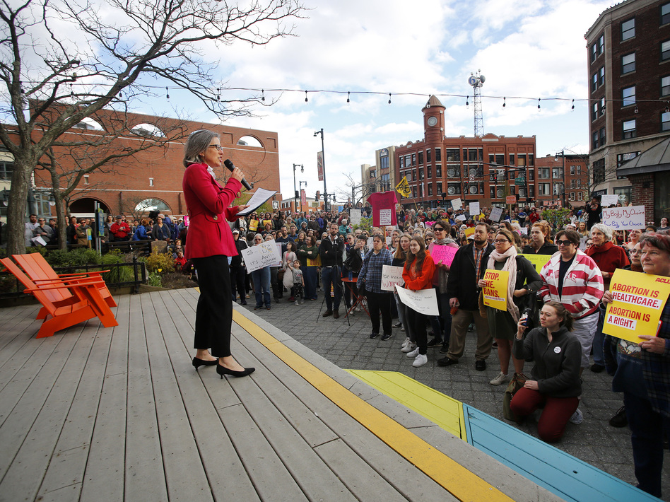 Alison Beyea of ACLU of Maine speaks during an abortion-rights rally at Congress Square Park in Portland, Maine, in May. Democrats elected last November have pushed through two laws that expand access to abortion in the state.