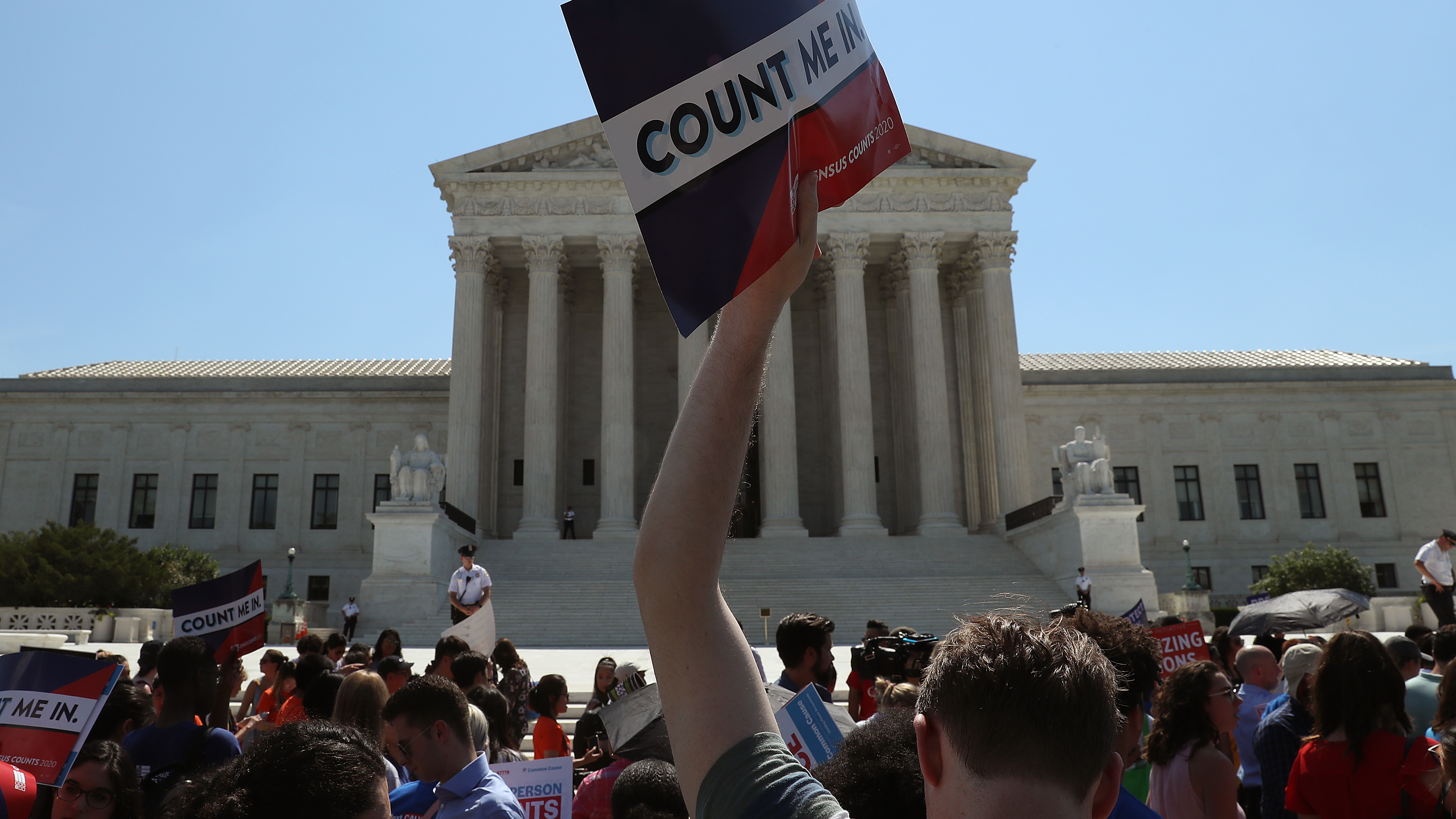 People gather in front of the Supreme Court last week, some opposing the controversial citizenship question that the Trump administration tried to add to the 2020 census.