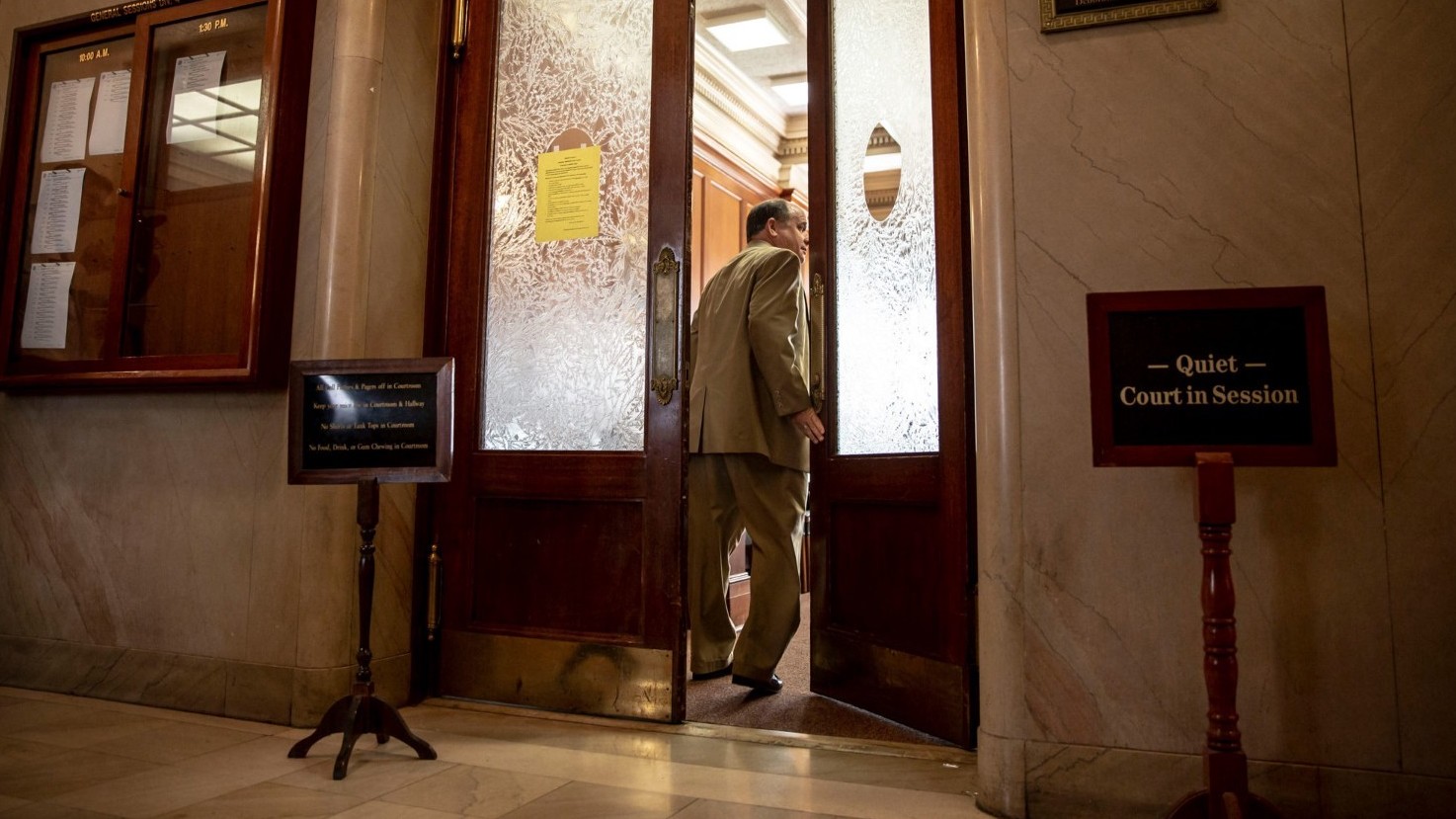 R. Alan Pritchard, one of two attorneys for Methodist Le Bonheur Healthcare, heads into Shelby County General Sessions Court Wednesday in Memphis. He asked the court to drop more than two dozen cases as the hospital reviews its collection policies.