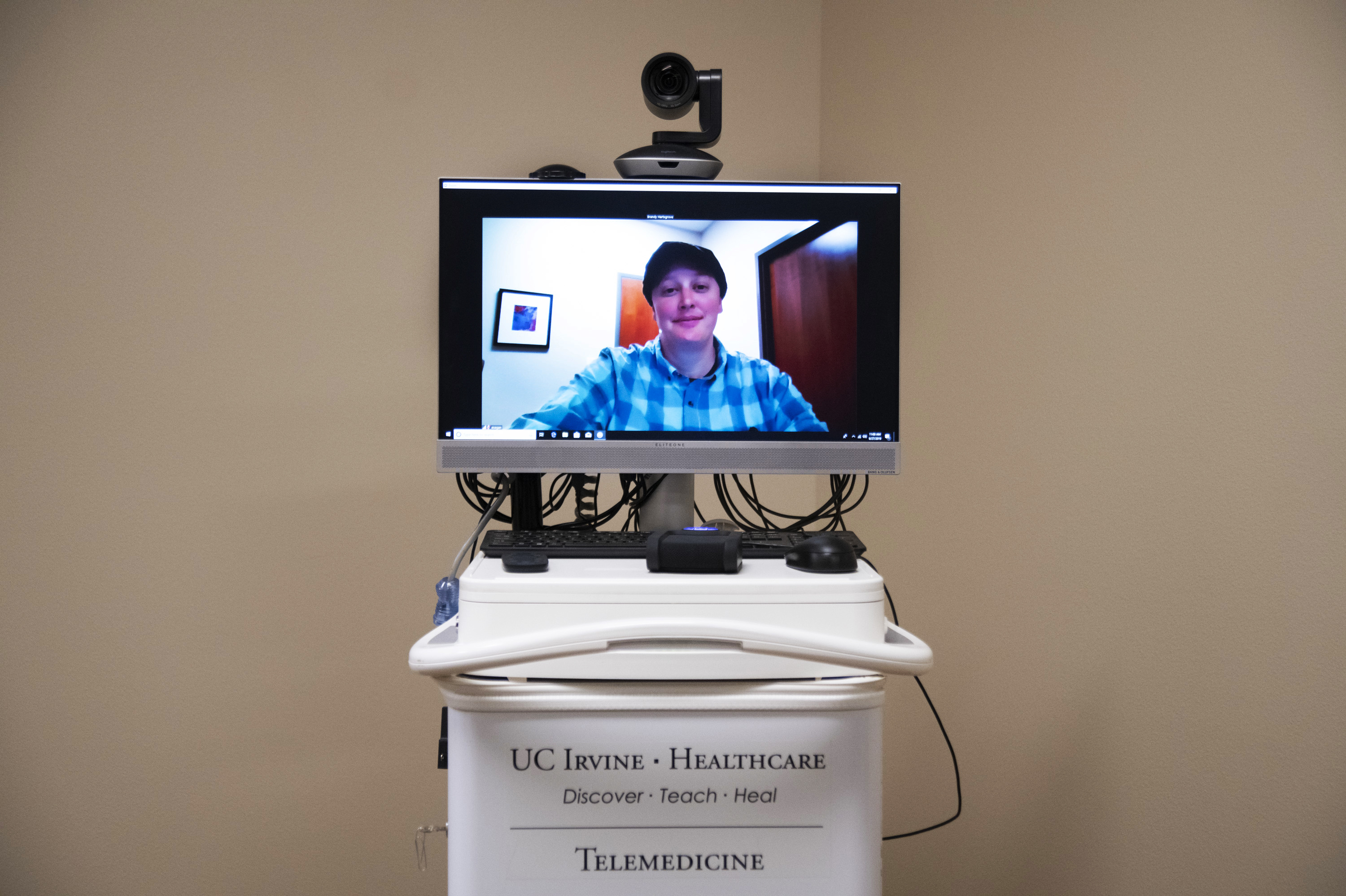 With Rural Health Care Stretched Thin, More Patients Turn To Telehealth 1 Coordinator Brandy Hartsgrove demonstrates how the telehealth connection works at The Chapa-de Indian Health Clinic in Grass Valley, Calif. Via this video screen, patients can consult doctors hundreds of miles away.
