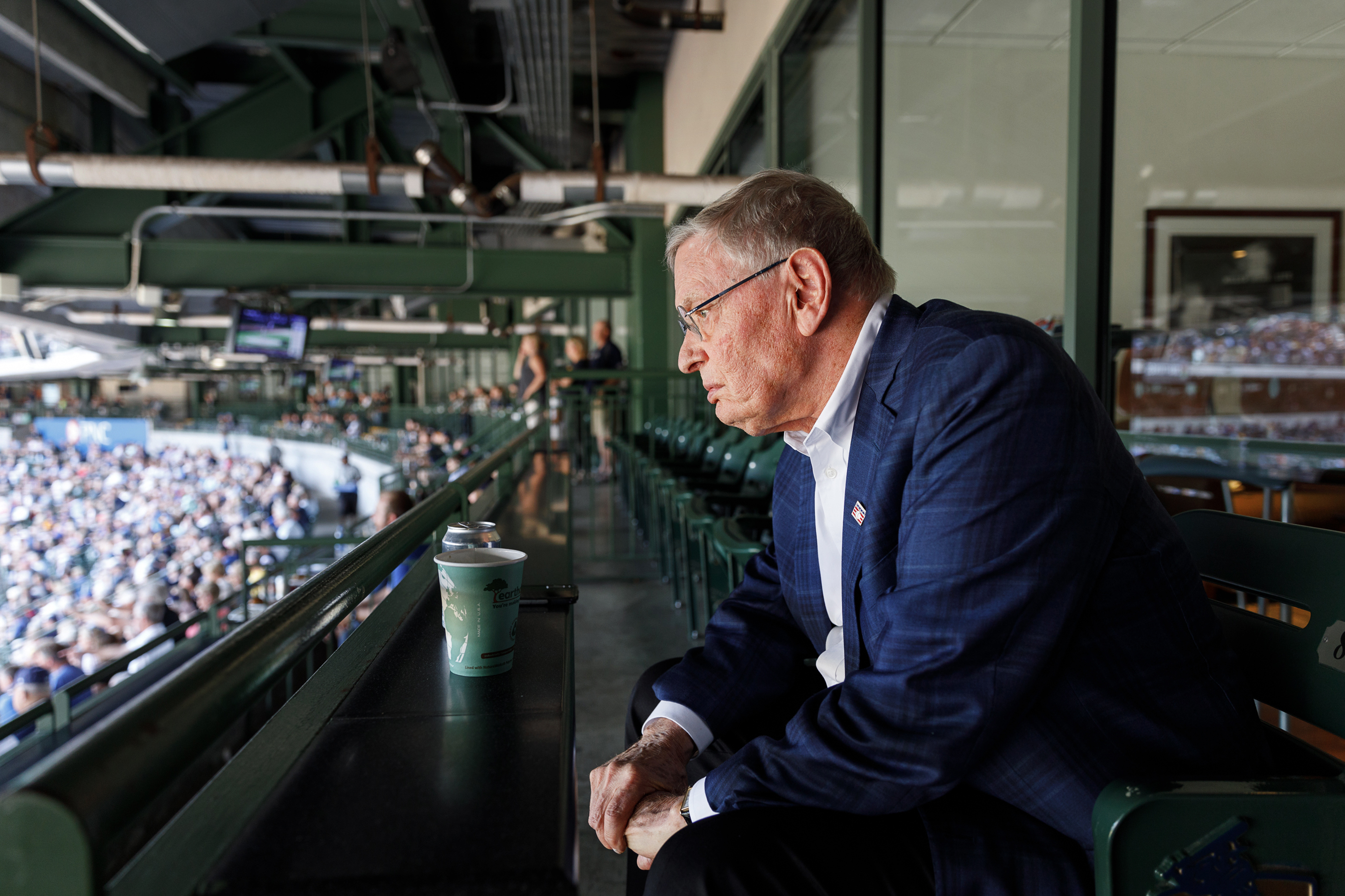 Former Major League Baseball Commissioner Bud Selig sits outside his luxury suite to watch the Milwaukee Brewers game at Miller Park. His new book reveals how he navigated tumultuous events in his career like the devastating player strike and the spread of performance-enhancing drugs. (Sara Stathas for NPR)