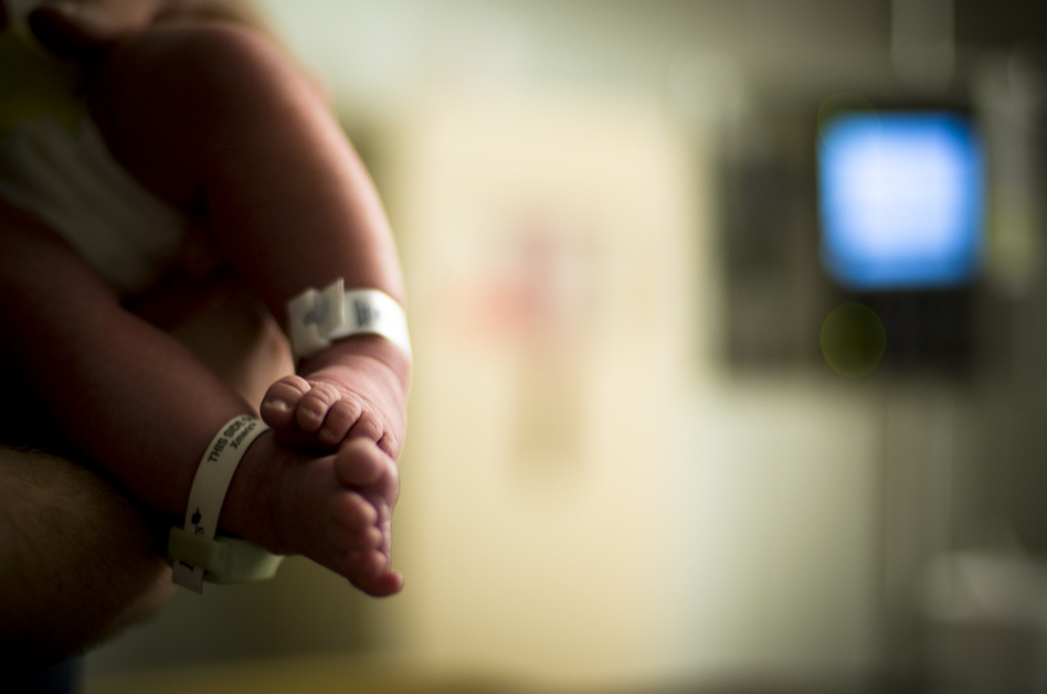 A decade ago, it seemed inevitable that every newborn would get a complete gene scan. But there are technical challenges and practical concerns. (Brooke Pennington/Getty Images)