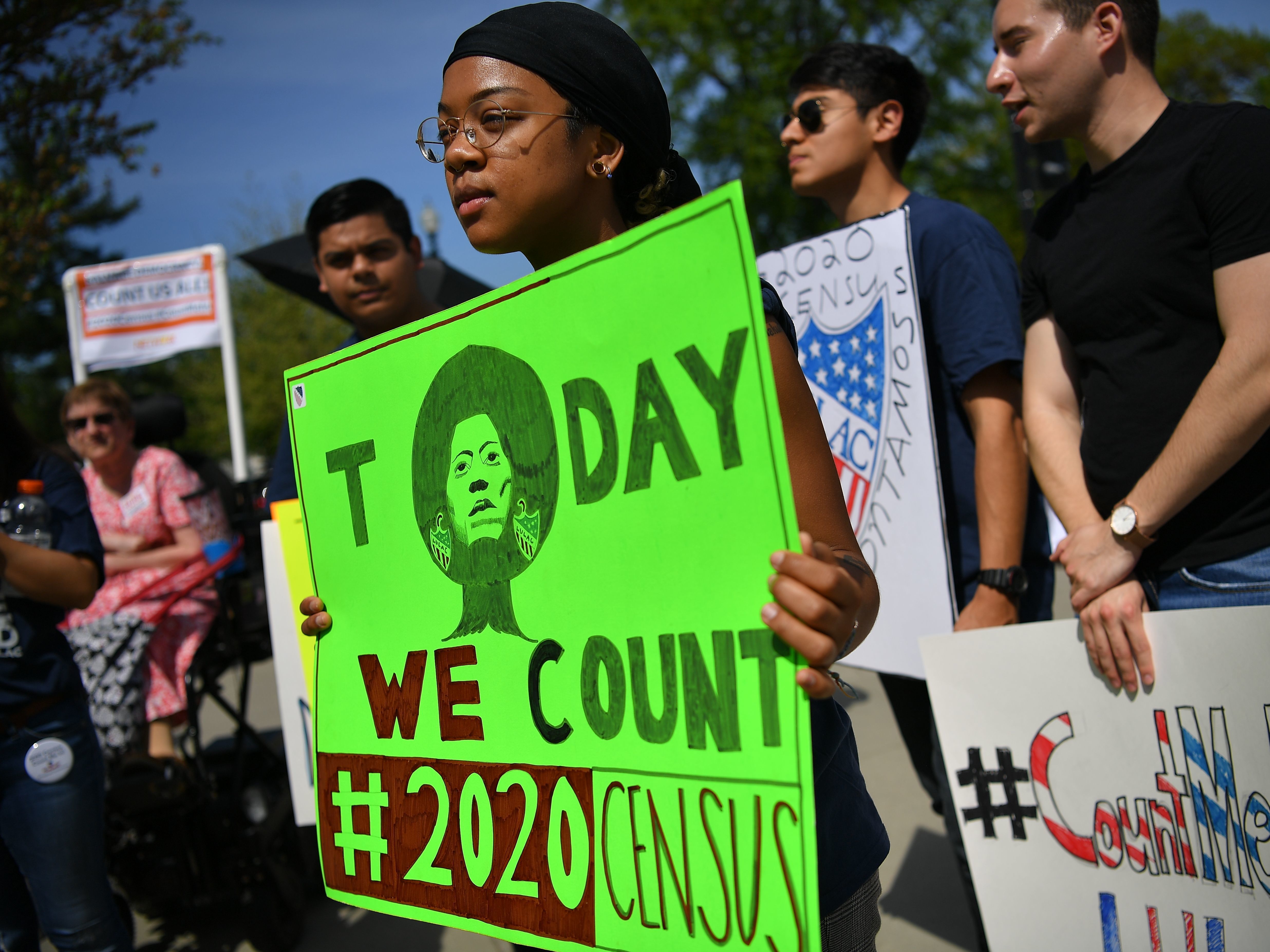 Demonstrators against a proposal to add a citizenship question to the 2020 census protest outside the U.S. Supreme Court in Washington, D.C., in April. (AFP/Getty Images)